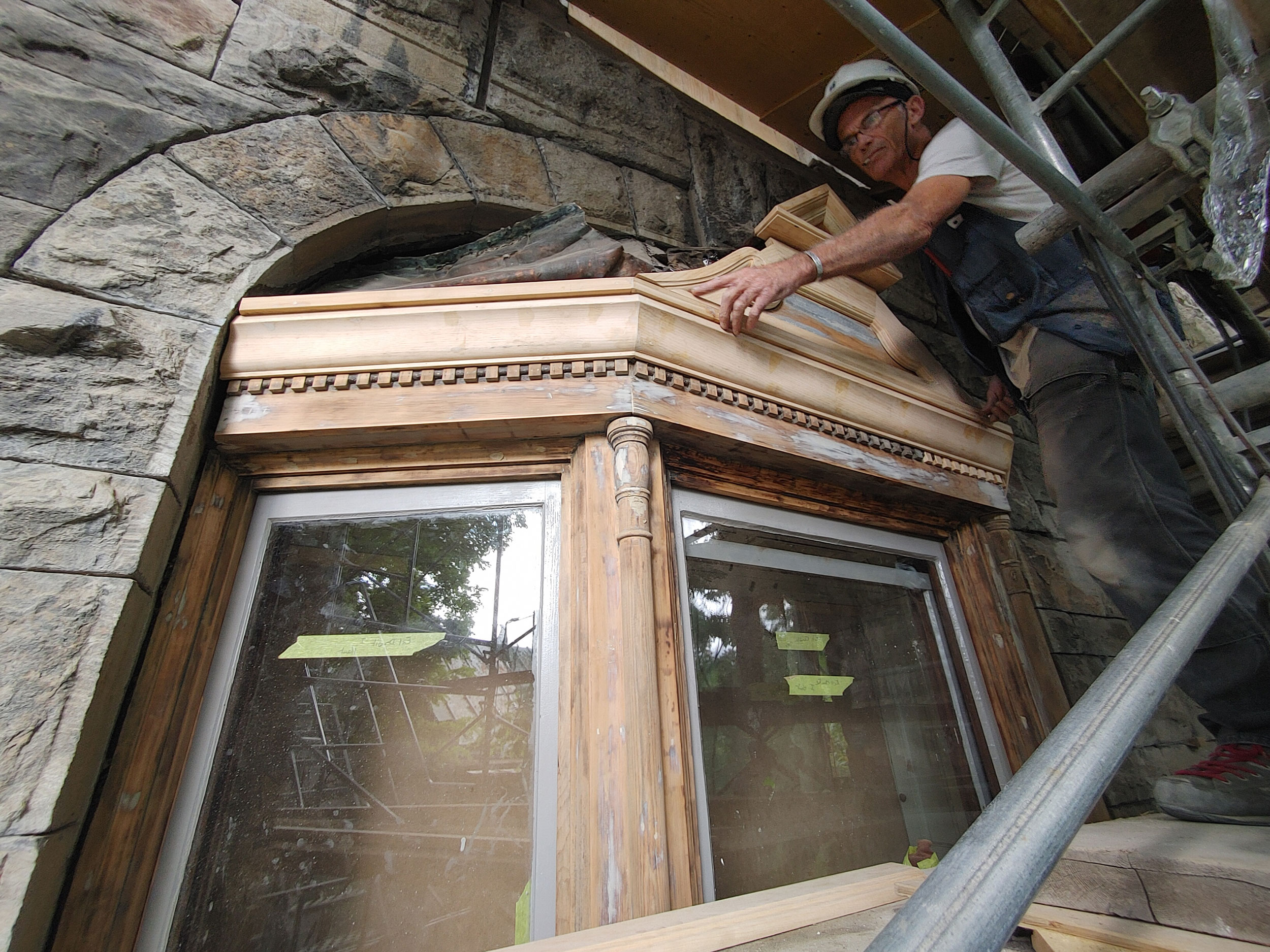restoration in progress of landmark wooden bay window