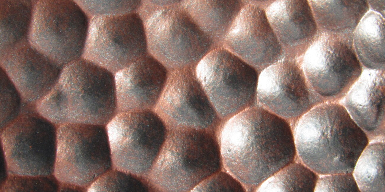 sculpted hammered copper texture